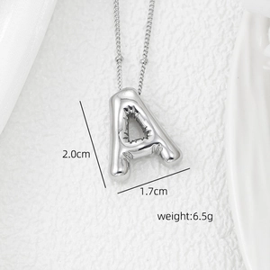 Detail showing dimensions of silver balloon letter A pendant necklace with glossy finish