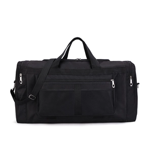 Black durable nylon travel bag with dual handles and adjustable shoulder strap feature