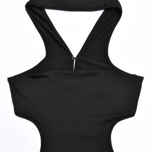 Detail view of black halter neck dress with metal front hook fasteners and stretchy fabric