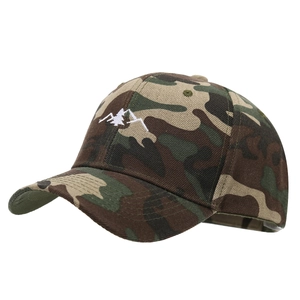 Classic camo baseball cap with white mountain and tree embroidery in a 45-degree side view