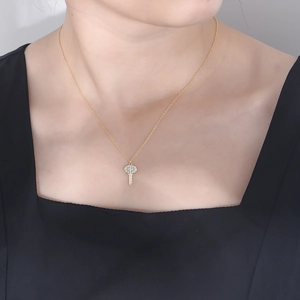 925 silver gold-plated key pendant necklace with micro-pave cubic zirconia on woman