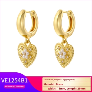 Detail of vintage heart earrings with pearls and zircon in 15mm by 29mm size