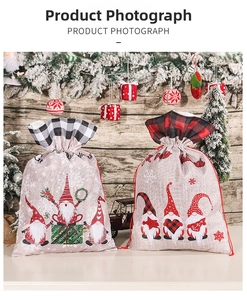 Close-up of burlap Christmas gift bags with gnome motifs and festive drawstring closure