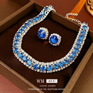 Luxury blue crystal necklace and earrings set with white diamond pavé in a gift box