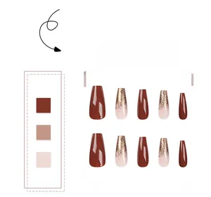 Detail of dark coffee and pink gold glitter gradient press-on nails in trapezoid shape
