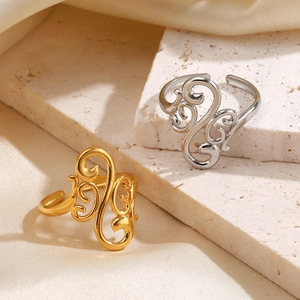 Minimalist gold and silver stainless steel open rings with abstract geometric patterns