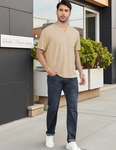 Close-up of beige waffle knit texture and V-neckline detail on a men's short sleeve T-shirt