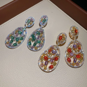 Vintage oval hollow zircon earrings in silver and gold plating with colorful gemstones