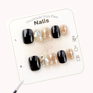 Faux ongles faits main motif étoile en noir et paillettes argentées, lot de 10 pièces