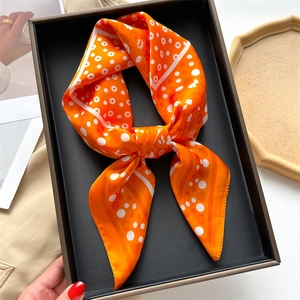 Orange silk scarf with polka dots and floral print in a gift box, elegant square shawl
