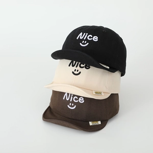 Detailed embroidery of Nice smiley face on soft-brim kids caps in black beige and brown