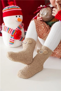 Close-up of cozy coral fleece socks for kids with cute 3D cartoon animal ears details