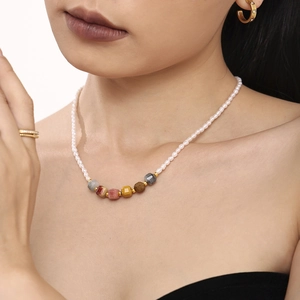 Handmade freshwater pearl necklace with multi-colored faceted stones and gold spacers