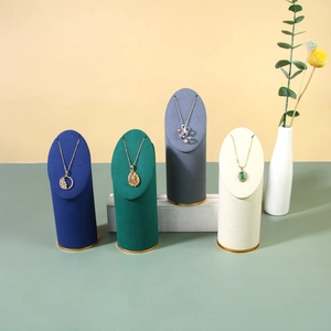 Velvet jewelry display stand set with necklace holders on a premium marble base