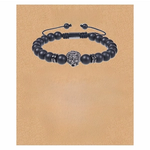 Detail of men's matte black bead bracelet with a metal lion head on a sentiment card