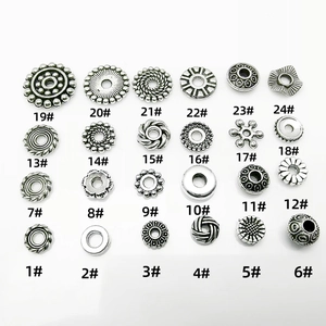 Assorted silver alloy spacer beads in various styles and patterns for DIY jewelry making
