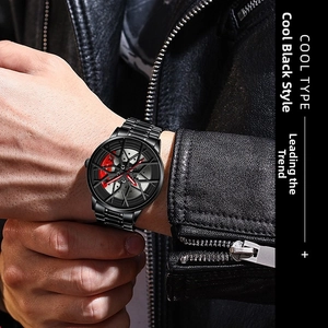Macro detail of the racing wheel hub watch dial with red caliper on a stainless steel strap