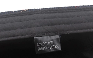 Detail view of the interior sweatband and material label showing 80% cotton and 20% polyester
