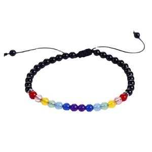 Fashion vintage beaded bracelet with rainbow stones and natural red agate on a white background