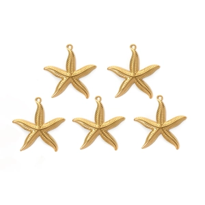 Five gold sea star pendants in 304 stainless steel with textured finish for jewelry