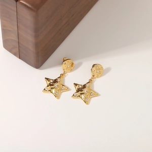 Elegant gold star drop earrings with hammered texture and sparkling zircon crystals
