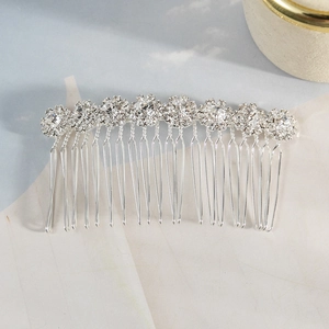 Elegant silver sunflower bridal hair comb with sparkly rhinestones and cubic zirconia