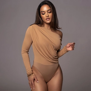 Detail view of camel one-shoulder bodysuit featuring side ruching and slim fit design