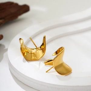 Minimalist 18K gold irregular twisted leaf stud earrings with a glossy metallic finish