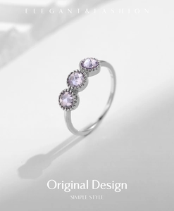 Detailed close-up of S925 silver ring featuring three lavender crystal round stones