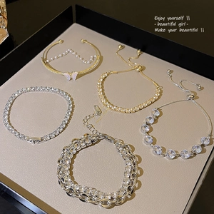 Luxurious collection of pearl and zircon bracelets with gold and silver finishes