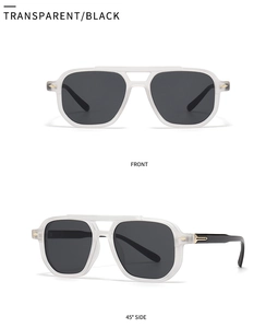 Detail view of retro translucent frames with gold metal accents and dark gray lenses