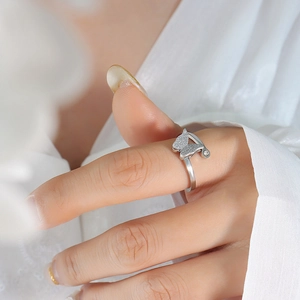Adjustable silver butterfly ring for women with sparkling pavé wings and clear gem