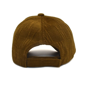 Detail view of the brown knitted texture and adjustable back on this baseball cap