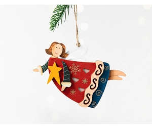 Close-up of hand-painted wooden Christmas angel ornament with snowflake details