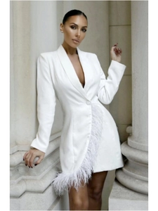 Close-up of white blazer dress featuring elegant feather trim and chic tailored waistline