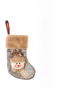 Detail of champagne gold Christmas stocking with plush cuff and sequin snowman doll
