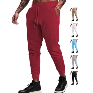 Burgundy waffle knit joggers for men with drawstring waist and breathable fabric texture