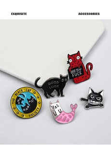Detailed view of creative cat enamel pins set featuring cartoon feline designs on ceramic