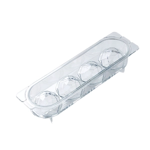Clear 4-grid round ice cube mold creating diamond-cut spherical ice balls