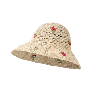 Women's beige woven straw sun hat featuring red embroidered strawberry patterns