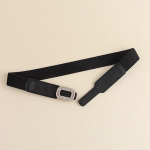 Women's black elastic waist belt with a sparkling gold rhinestone buckle for dresses