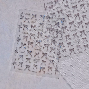 Exquisite shell-shine and glitter bow nail art stickers with ultra-thin adhesive backing
