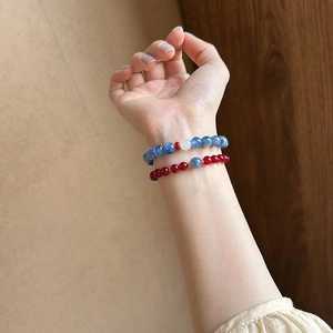 Ethnic style beaded bracelet set with dark blue crystals and natural red agate beads