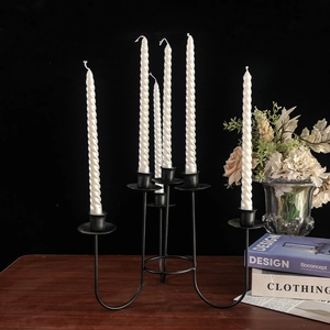 Candelabro nórdico de metal negro de 6 brazos con velas en espiral para la mesa
