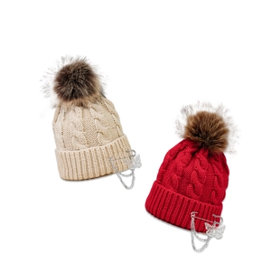 Winter chunky knit beanie with butterfly pin and faux fur pompom in beige and red