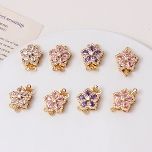 Detailed view of flower jewelry clasps with zircon inlay for DIY bracelet making