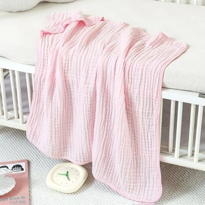Close-up of light pink 6-layer muslin cotton gauze texture for infant hooded towel