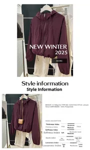 Detail view of deep purple windproof hooded jacket in lightweight polyamide fabric