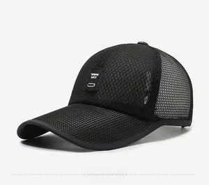 Detail view of the breathable black mesh fabric and structured brim on this baseball cap