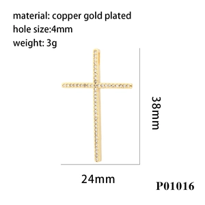 Detail view of 38mm x 24mm gold plated copper cross pendant with zircon stones